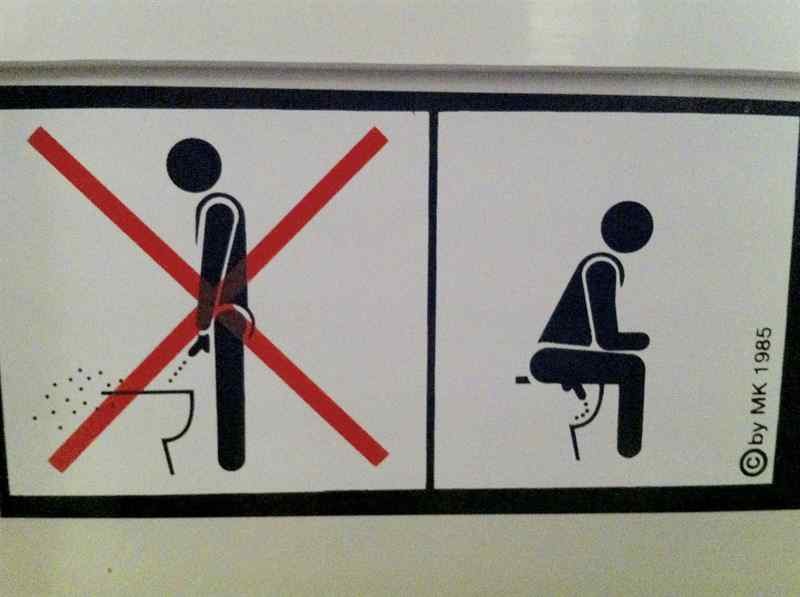 Andrew Kerrigan -Munich, Germany, this sign encouraged men to sit down to urinate, but to me it looks like he is passing multiple kidney stones. www.TravelSmaht.com